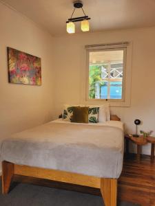 Letto o letti in una camera di Lizard King Hotel & Suites