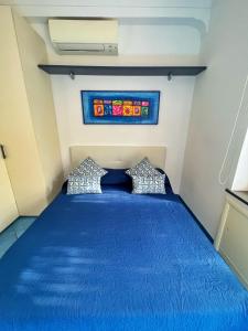 Кровать или кровати в номере Augusto Capri Apartment