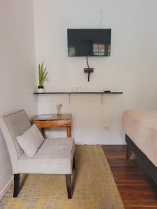 TV o dispositivi per l'intrattenimento presso Lizard King Hotel & Suites