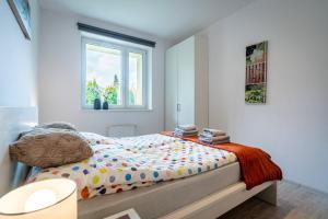 Tempat tidur dalam kamar di Apartament Ustronny
