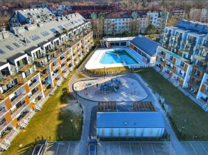 Bazén v ubytovaní Apartament Turkusowy Kołobrzeg Podczele alebo v jeho blízkosti