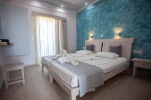 Кровать или кровати в номере Villa Bel Passo Apartments