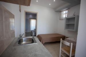 Кровать или кровати в номере Villa Bel Passo Apartments