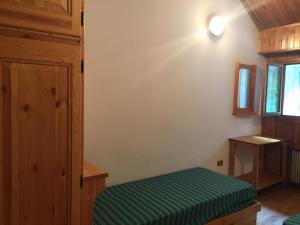 Ένα ή περισσότερα κρεβάτια σε δωμάτιο στο Casa Marina presso residence Camporosso