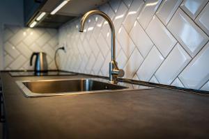 Kuchyňa alebo kuchynka v ubytovaní Apartamenty Ustronne Liściasta