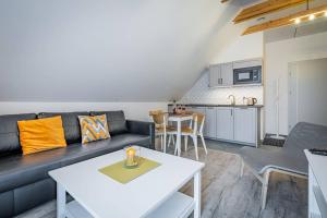 Kuchyňa alebo kuchynka v ubytovaní Apartamenty Ustronne Liściasta
