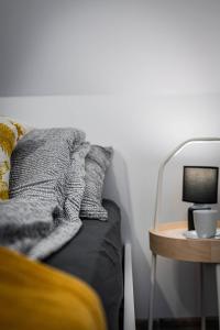 Televízia a/alebo spoločenská miestnosť v ubytovaní Apartamenty Ustronne Liściasta