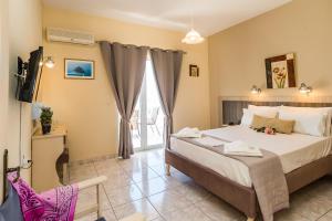 Ένα ή περισσότερα κρεβάτια σε δωμάτιο στο Sole e Mare Family Apartments