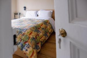 A bed or beds in a room at Federico II