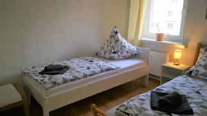 Ένα ή περισσότερα κρεβάτια σε δωμάτιο στο Apartment am Südpark