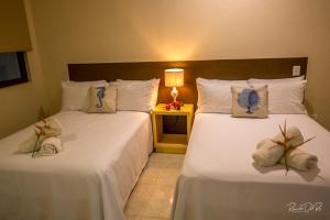 Ένα ή περισσότερα κρεβάτια σε δωμάτιο στο Azcapri Villa Boutique & Spa