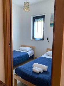 Letto o letti in una camera di Essence Appartament