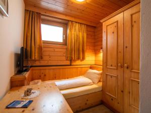 TV a/nebo společenská místnost v ubytování Ferienhaus Oblasser I