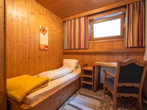 Postel nebo postele na pokoji v ubytování Ferienhaus Oblasser I