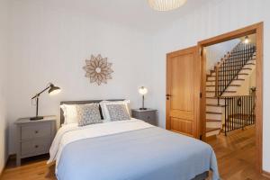 Ένα ή περισσότερα κρεβάτια σε δωμάτιο στο Casa Caetano by An Island Apart