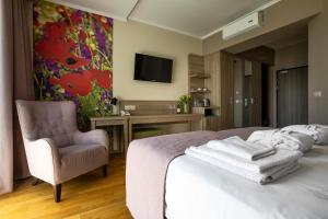 Televízia a/alebo spoločenská miestnosť v ubytovaní Terma Słowacki Resort Medical Spa