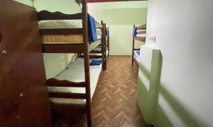 Voodi või voodid majutusasutuse Kataryn Hostel toas
