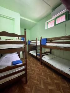 Voodi või voodid majutusasutuse Kataryn Hostel toas