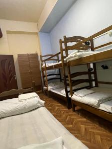 Voodi või voodid majutusasutuse Kataryn Hostel toas