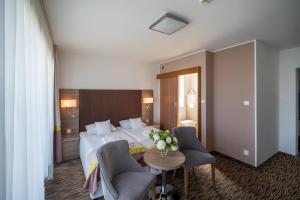 Postel nebo postele na pokoji v ubytování Perła Bałtyku + 20 fotografií