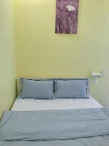 Postel nebo postele na pokoji v ubytování Dalat Backpacker's Alley Hostel