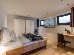Postel nebo postele na pokoji v ubytování Chaleo Apartments