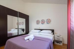 Posteľ alebo postele v izbe v ubytovaní Seaview Apartment Marita