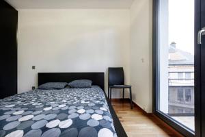 Postel nebo postele na pokoji v ubytování Topfloor Luxembourg Ville