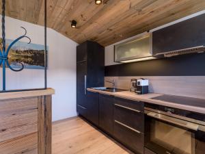Kuchyň nebo kuchyňský kout v ubytování Chaleo Apartments