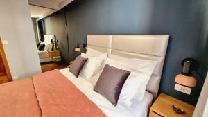 Postel nebo postele na pokoji v ubytování Etal Luxury Apartment
