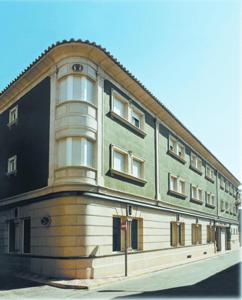 a large building with aventh floor at Hotel Isabel in Almussafes