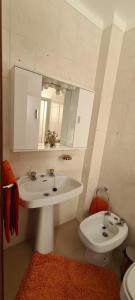 Koupelna v ubytování BBL APARTAMENTOS e QUARTOS