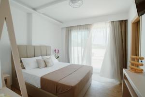 A bed or beds in a room at Villa Etoile