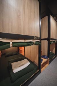 Katil atau katil-katil dalam bilik di Getcha Hostel