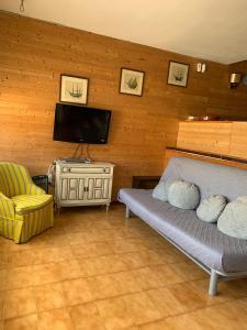 A seating area at Apartamento brisa marina Még 15 kép