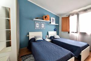 Posteľ alebo postele v izbe v ubytovaní Casa del Sole