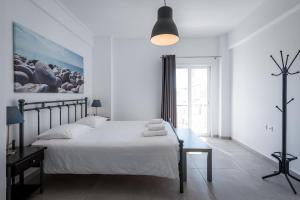 Milva Apartments客房内的一张或多张床位