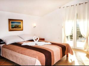 A bed or beds in a room at Villa Fabry