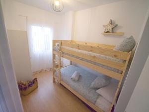 Posteľ alebo postele v izbe v ubytovaní Apartamento Residencial Al Andalus 117, La Barrosa, Chiclana, Incluye parking a unos metros del mar + 25 fotografií