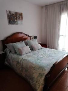 Ένα ή περισσότερα κρεβάτια σε δωμάτιο στο Apartamento para 6 personas en Barbastro