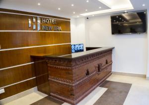 TV a/nebo společenská místnost v ubytování Hotel New Era