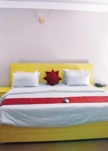 Postel nebo postele na pokoji v ubytování TRAVELLERS HOMELY