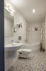 Kúpeľňa v ubytovaní Hotel H12****