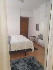 Postel nebo postele na pokoji v ubytování Modern, cozy studio + 7 fotografií