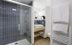 Appart Hotel Odalys City Toulouse Blagnac Aéroport的一间浴室