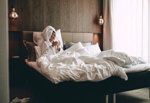 Postel nebo postele na pokoji v ubytování Stord Hotel