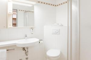 Koupelna v ubytování Hotel Der Stockinger