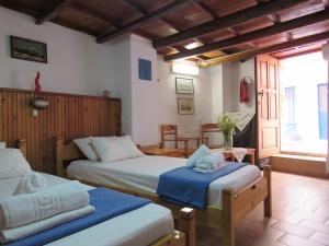 Postel nebo postele na pokoji v ubytování Guesthouse Chryssoula