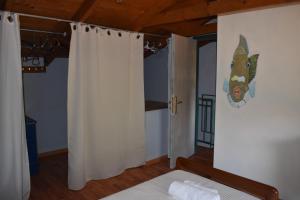 Postel nebo postele na pokoji v ubytování PIGADIA