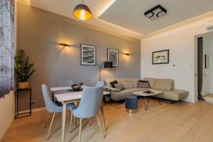 Posedenie v ubytovaní Sunset Bridge Apartment